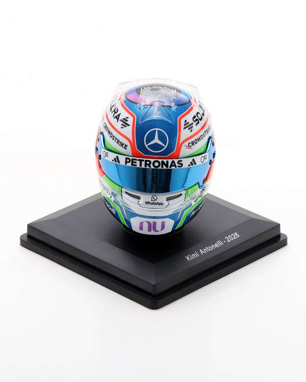 Kimi Antonelli 2026 1:5 scale resin helmet replica featuring team colours and a blue visor on a black base.