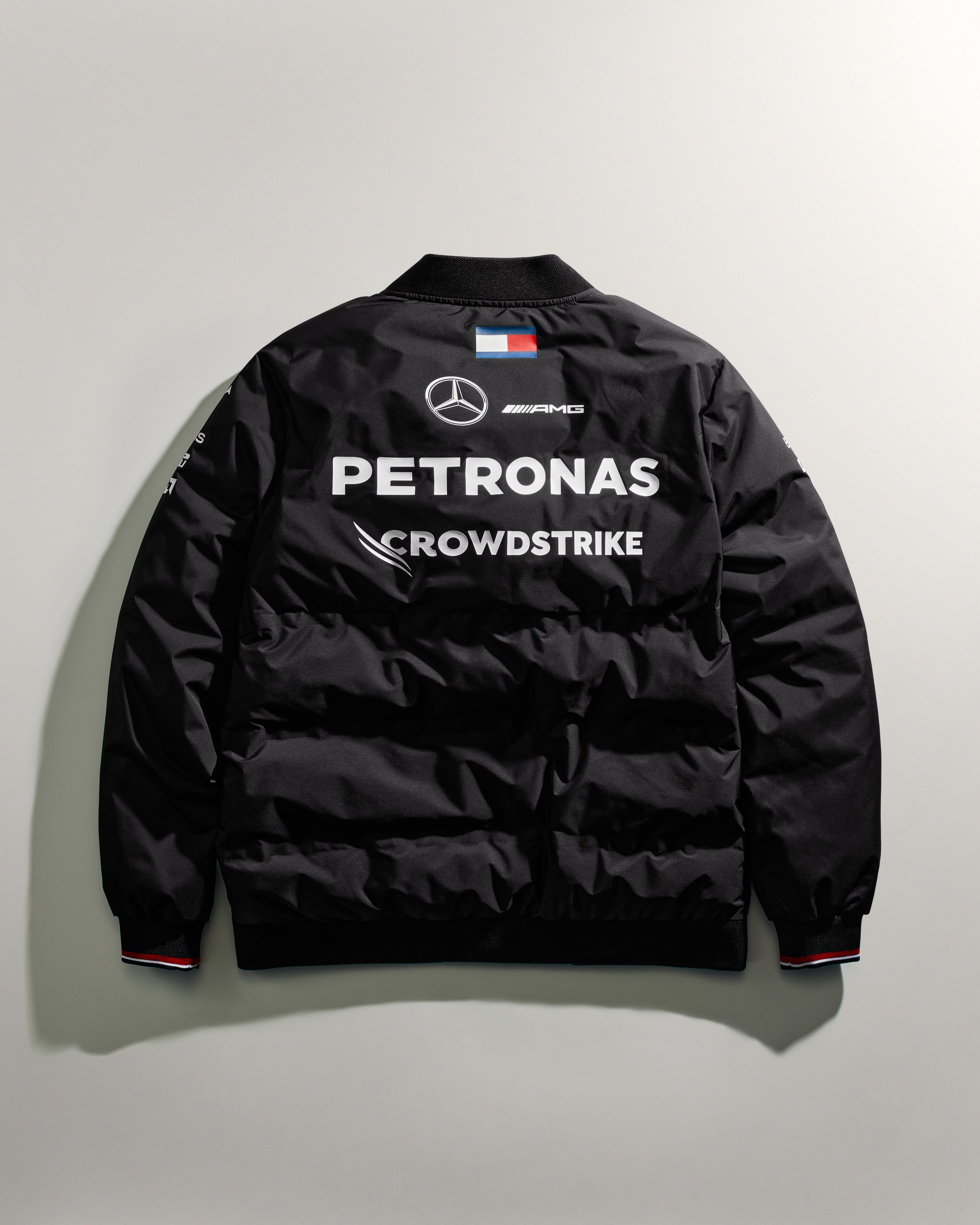 Mens 2024 Team Insulated Bomber Jacket Black Official Mercedes AMG PETRONAS F1 Team Store